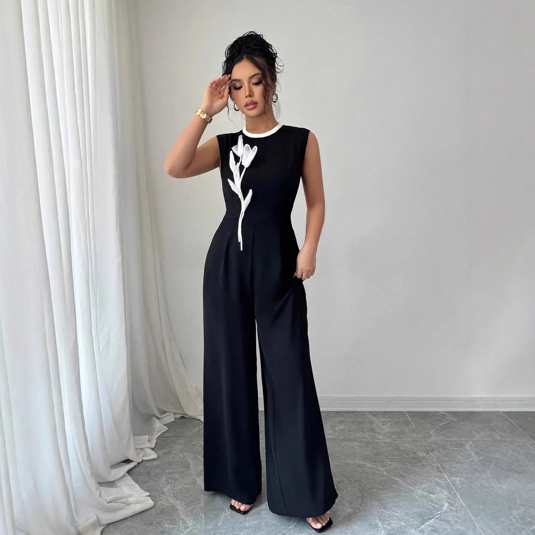 Elegant Embroidered Black Crew-Neck Sleeveless Wide-Leg Jumpsuit - Gizmo Galaxy