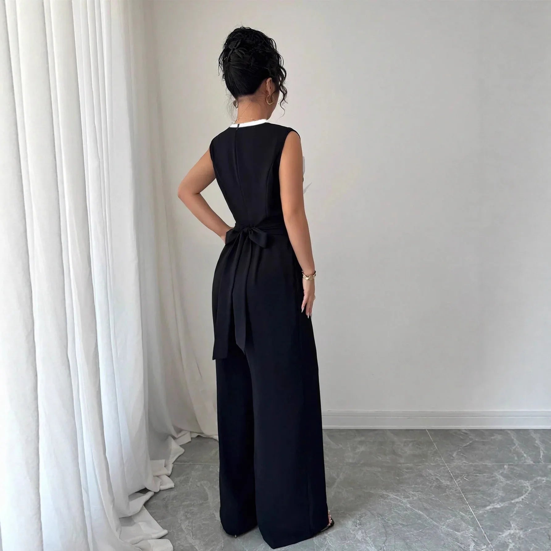 Elegant Embroidered Black Crew-Neck Sleeveless Wide-Leg Jumpsuit - Gizmo Galaxy