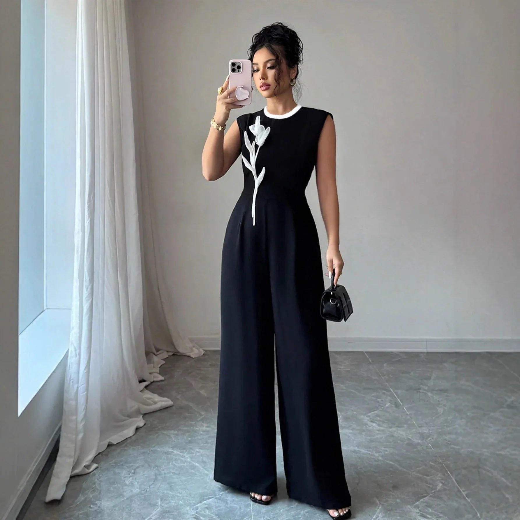 Elegant Embroidered Black Crew-Neck Sleeveless Wide-Leg Jumpsuit - Gizmo Galaxy